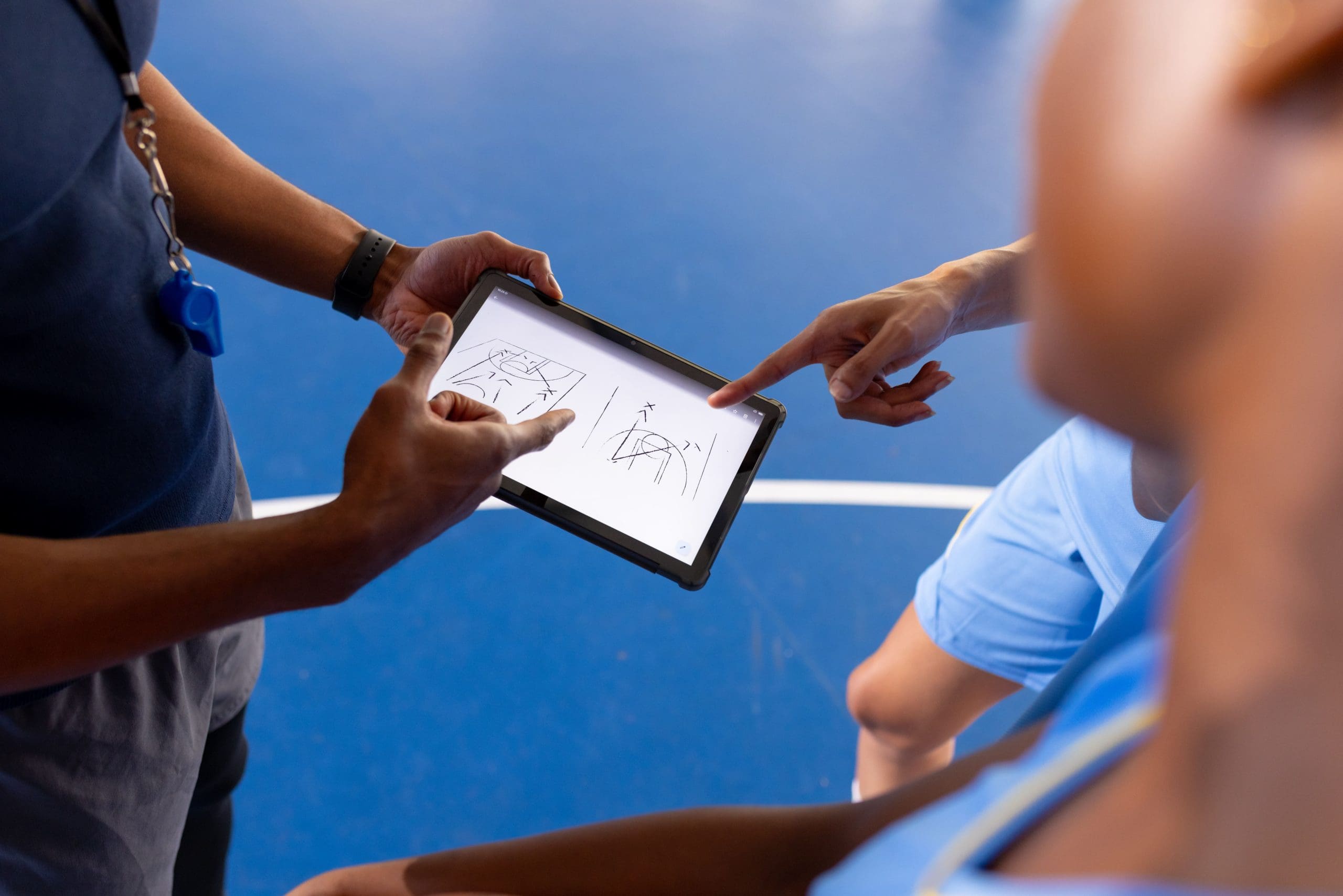 basketball-male-coach-using-tablet-to-discuss-game-2025-04-05-06-05-25-utc